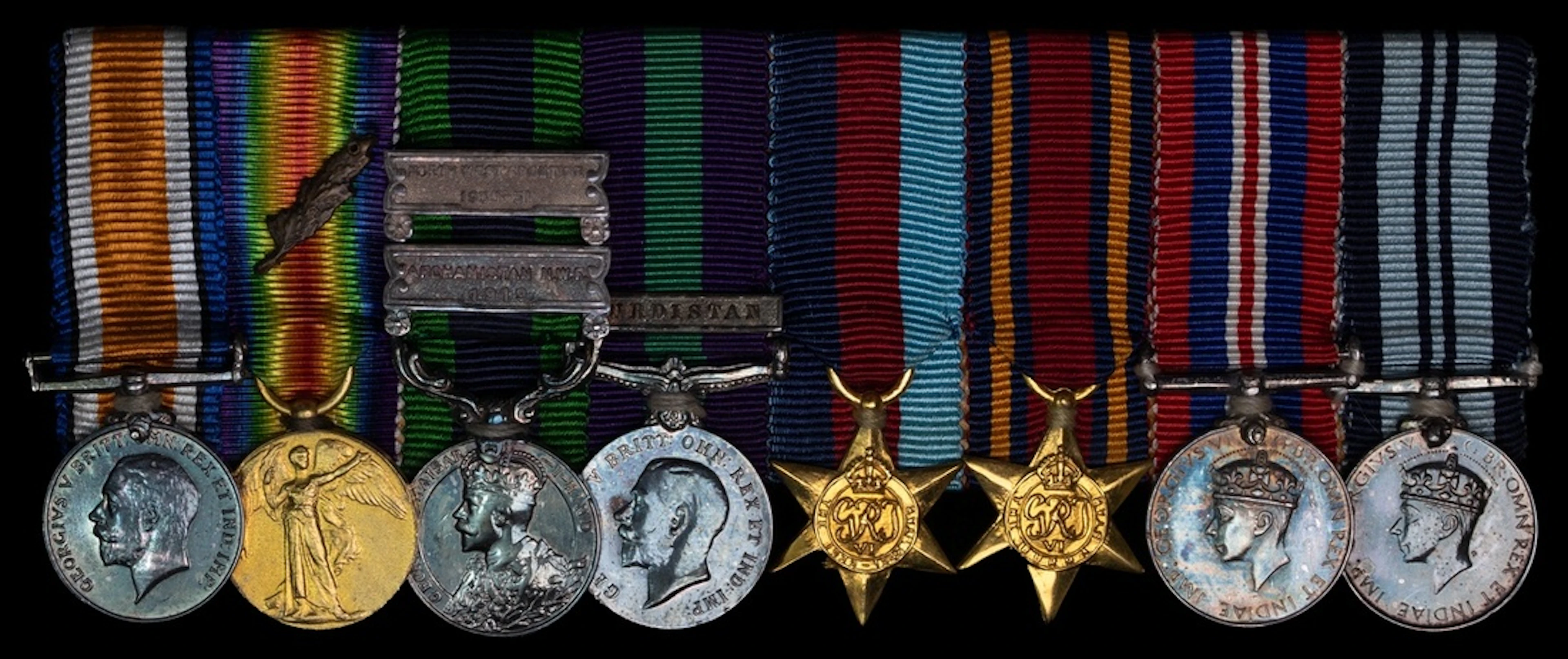 The mounted group of eight miniature dress medals worn by Brigadier