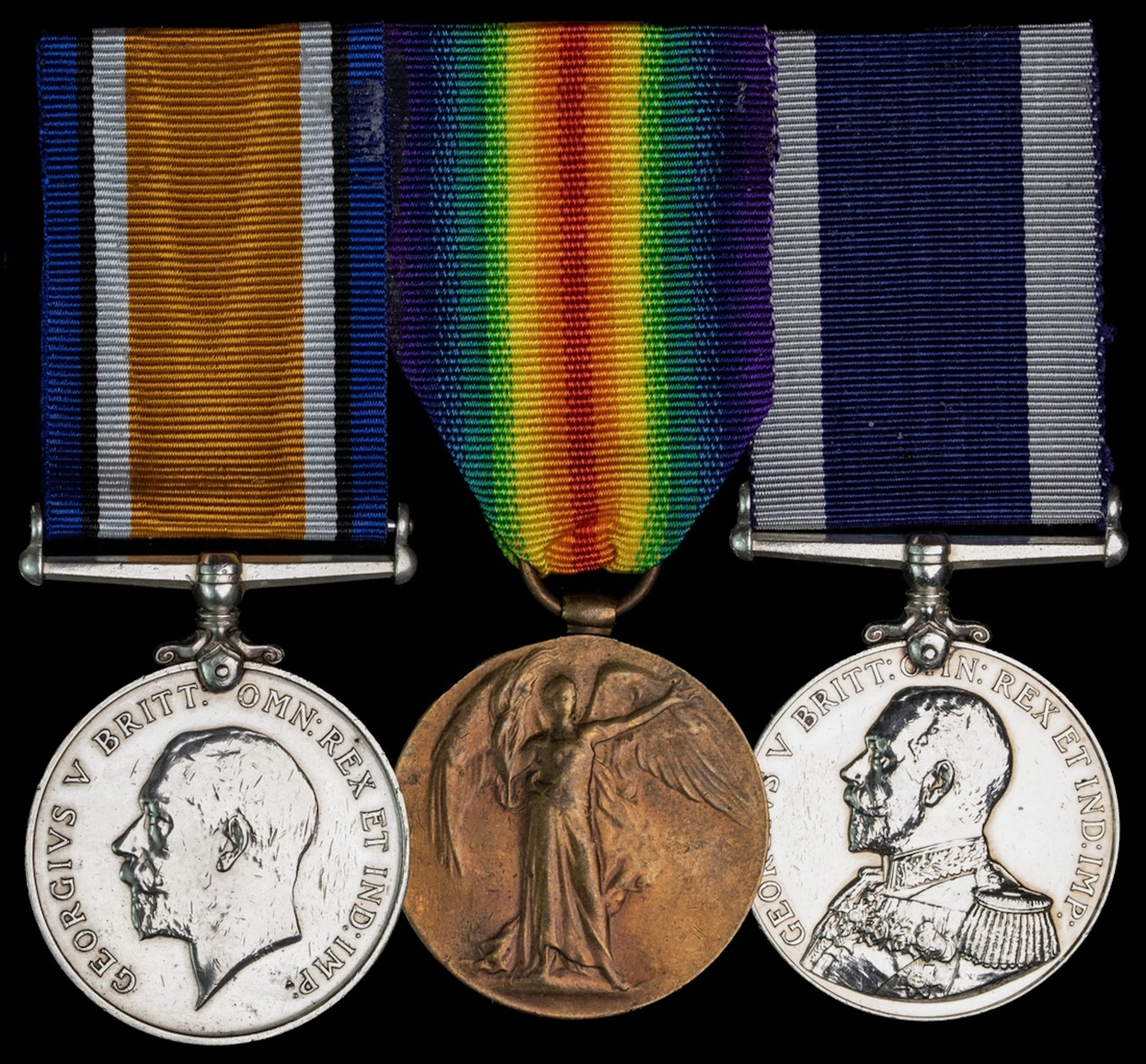Three: Leading Sick Berth Attendant J. Fitzgerald, Royal Navy, being