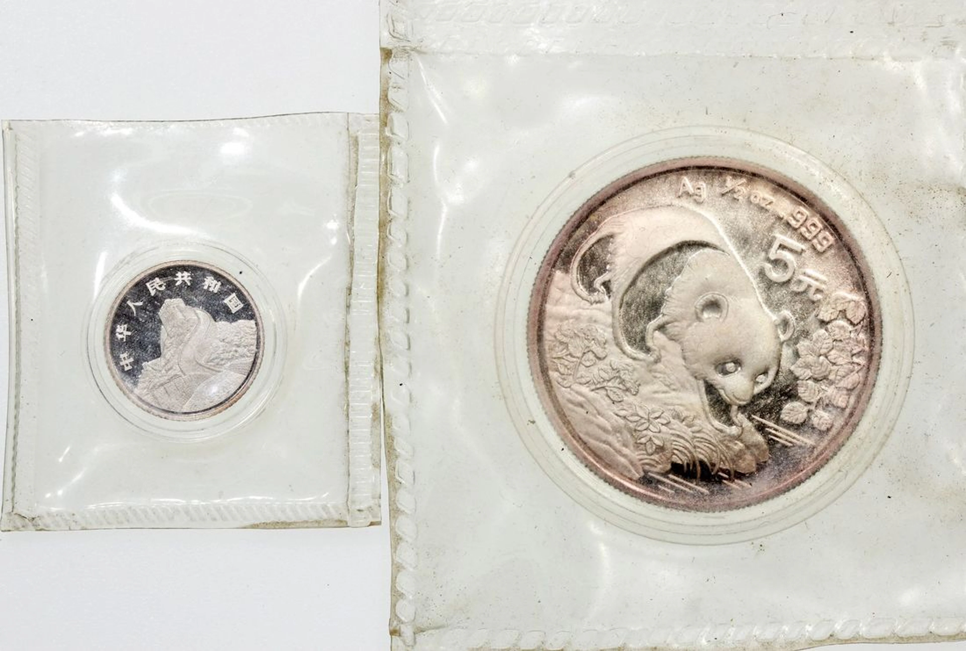People's Republic of China, a pair of silver coins, including 5 jiao