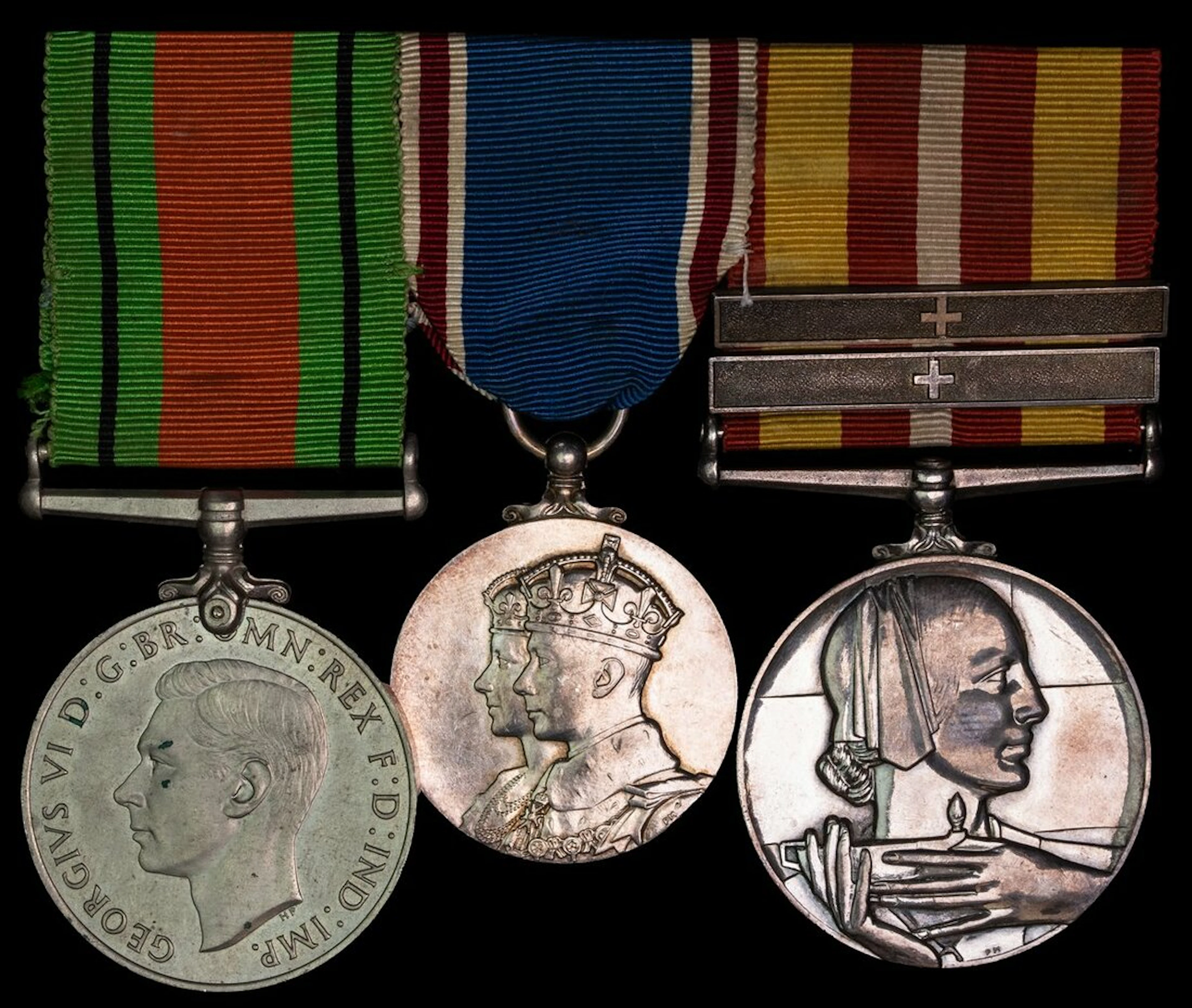 Three: Nurse E. M. Grant-Burls, Voluntary Aid Detachment Defence Medal