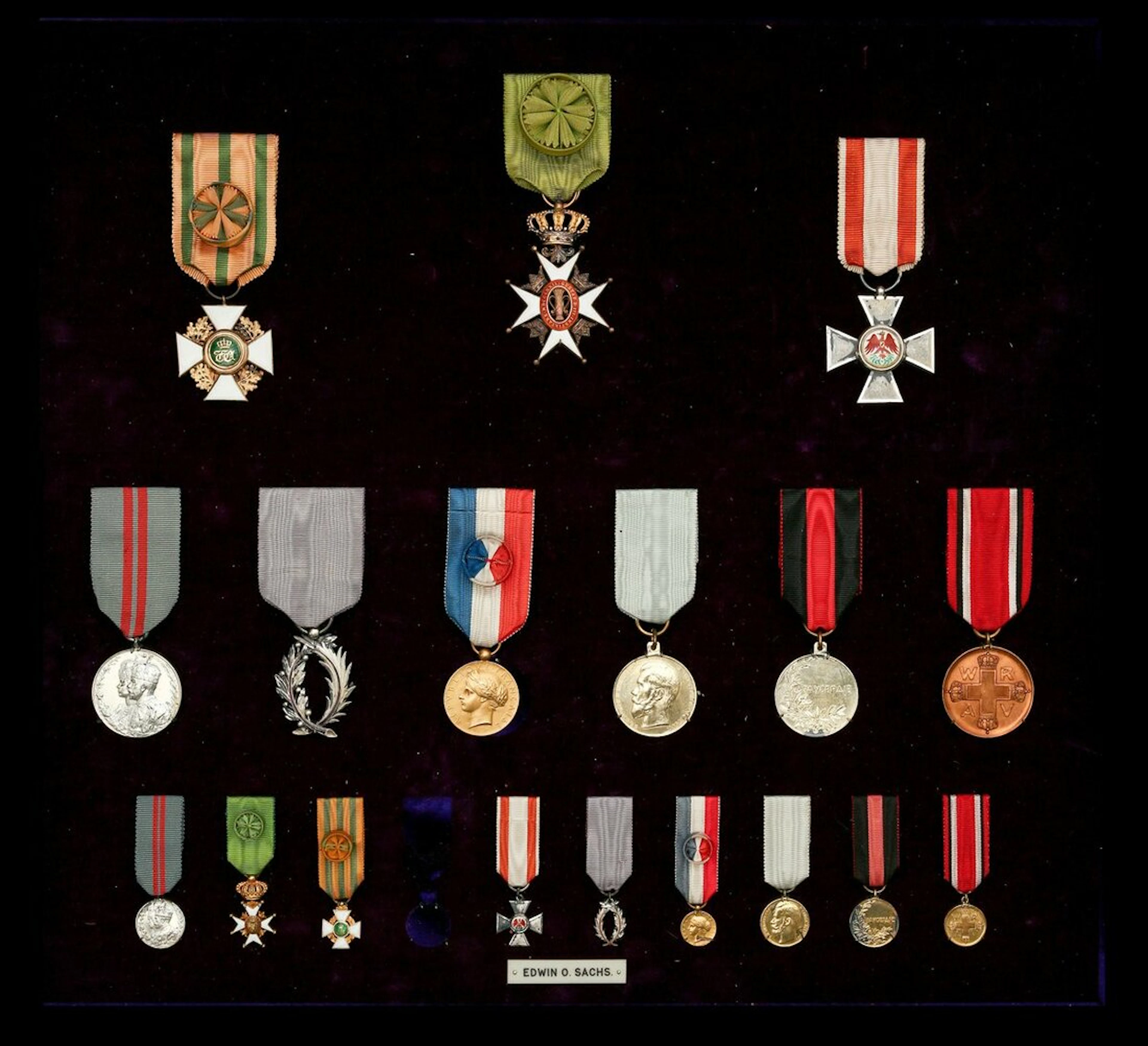 The framed group of nine awarded to E. O. Sachs, the famous theatre