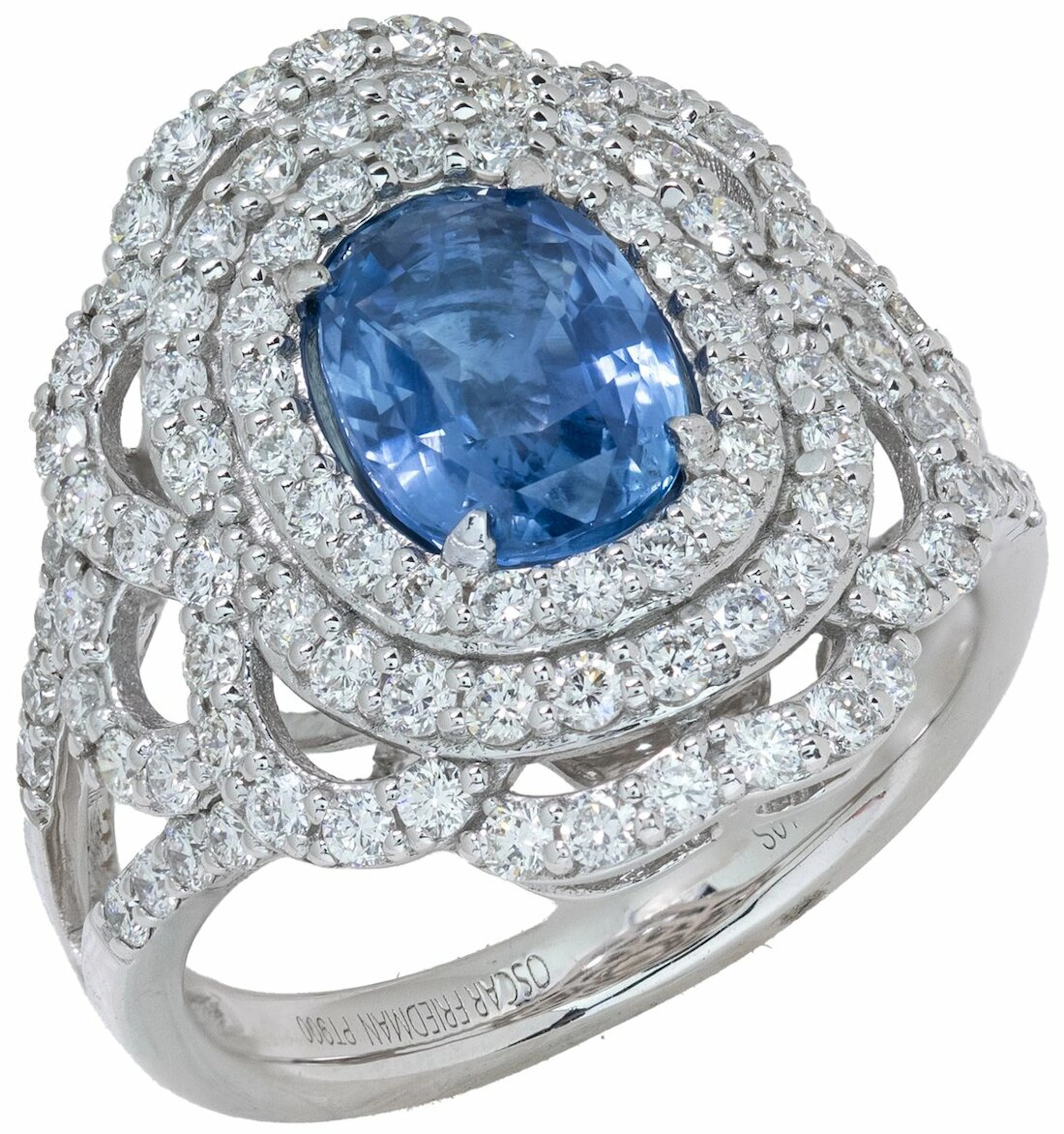 (Ω) AN UNHEATED SAPPHIRE AND DIAMOND COCKTAIL RING
