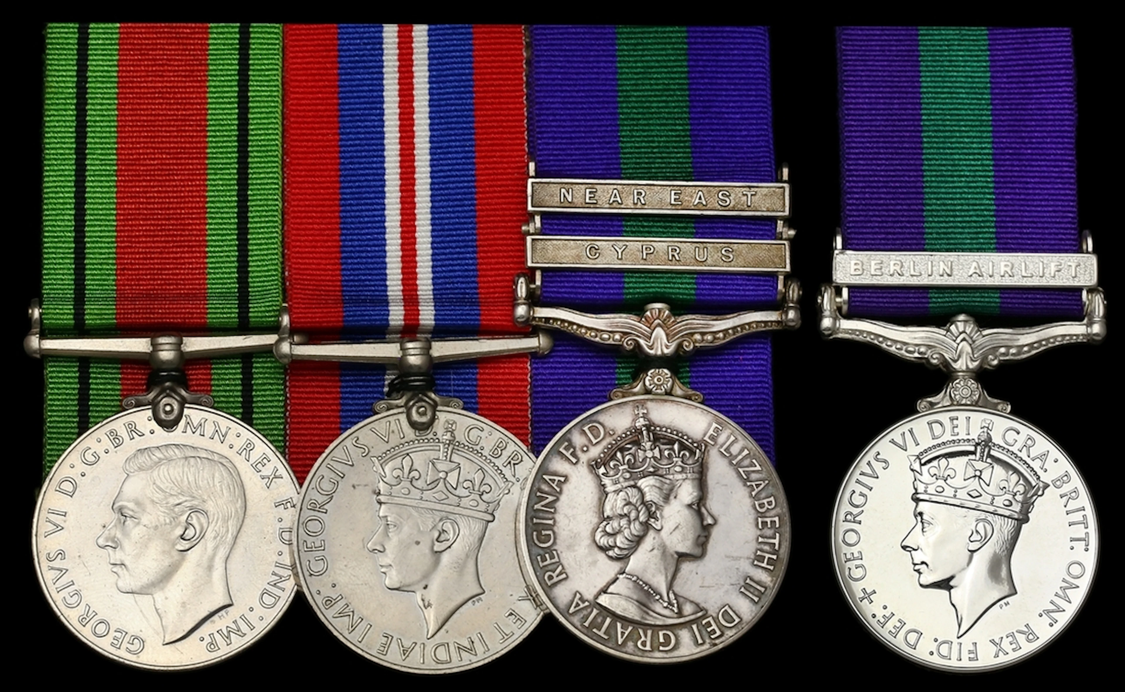 A rare Berlin Airlift and Suez Crisis group of four awarded to Flight