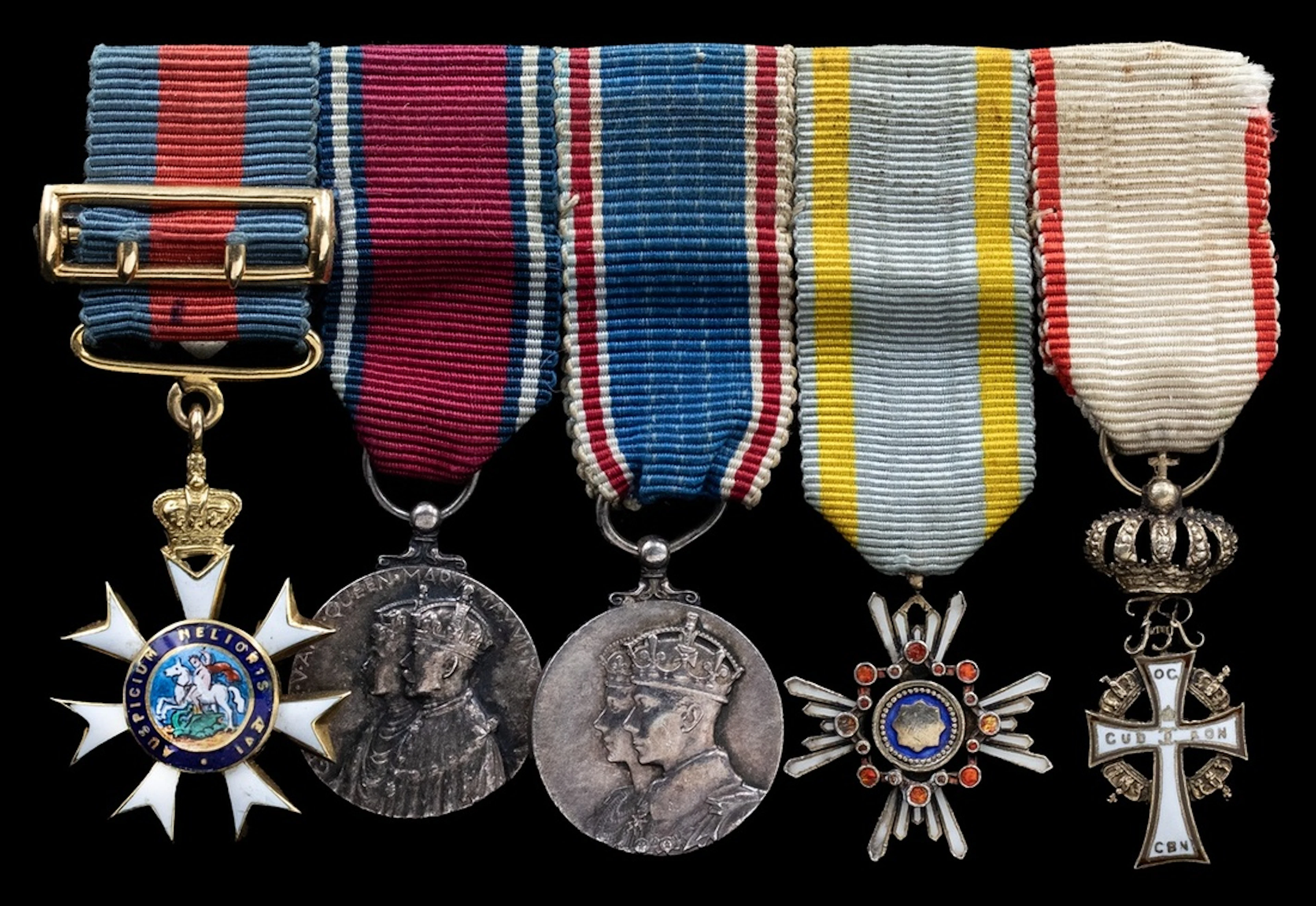A most attractive K.C.M.G./C.M.G. mounted group of five miniature