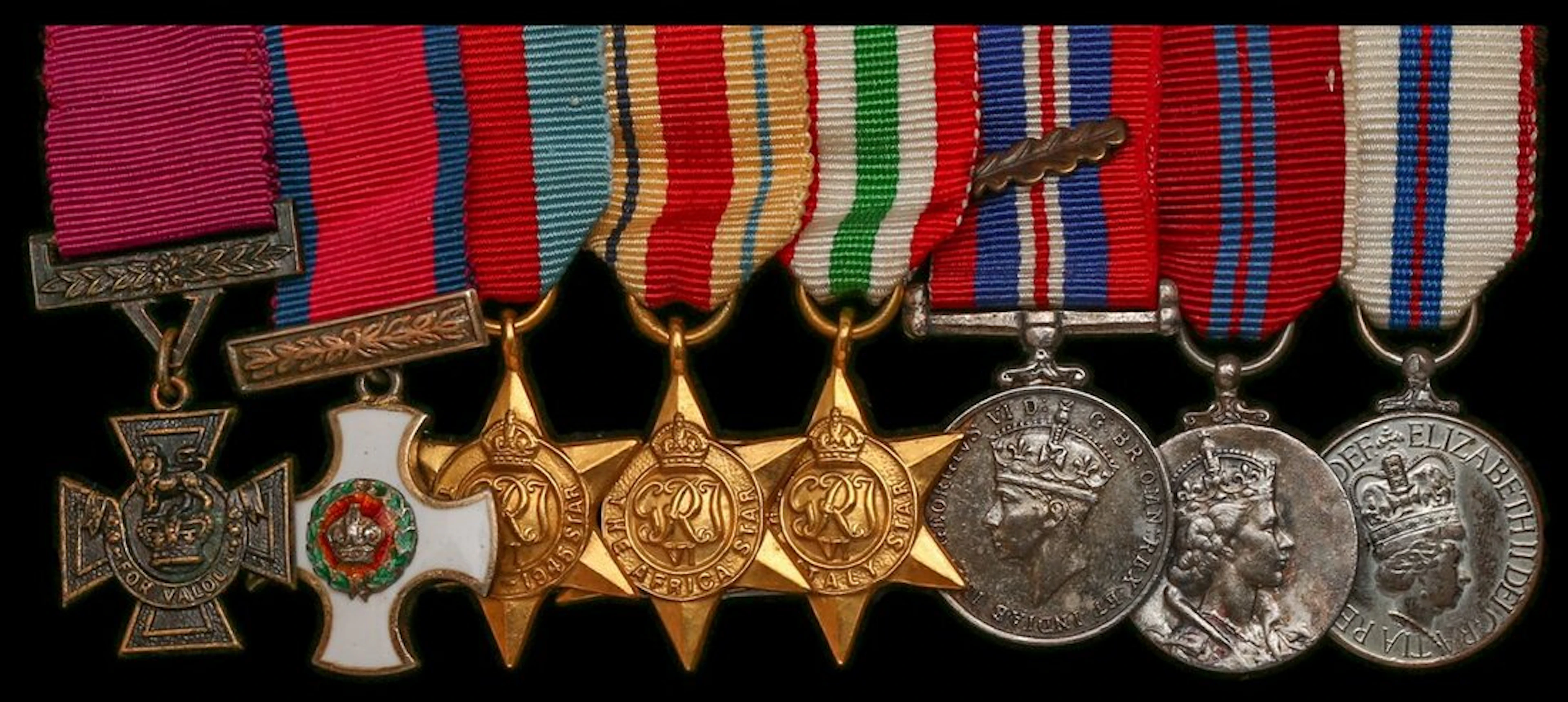 The mounted V.C., D.S.O. group of eight miniature dress medals worn