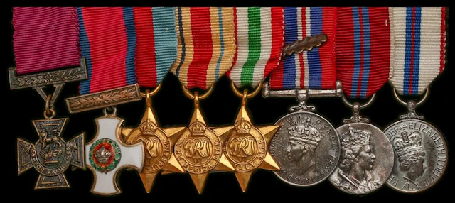 The mounted V.C., D.S.O. group of eight miniature dress medals worn