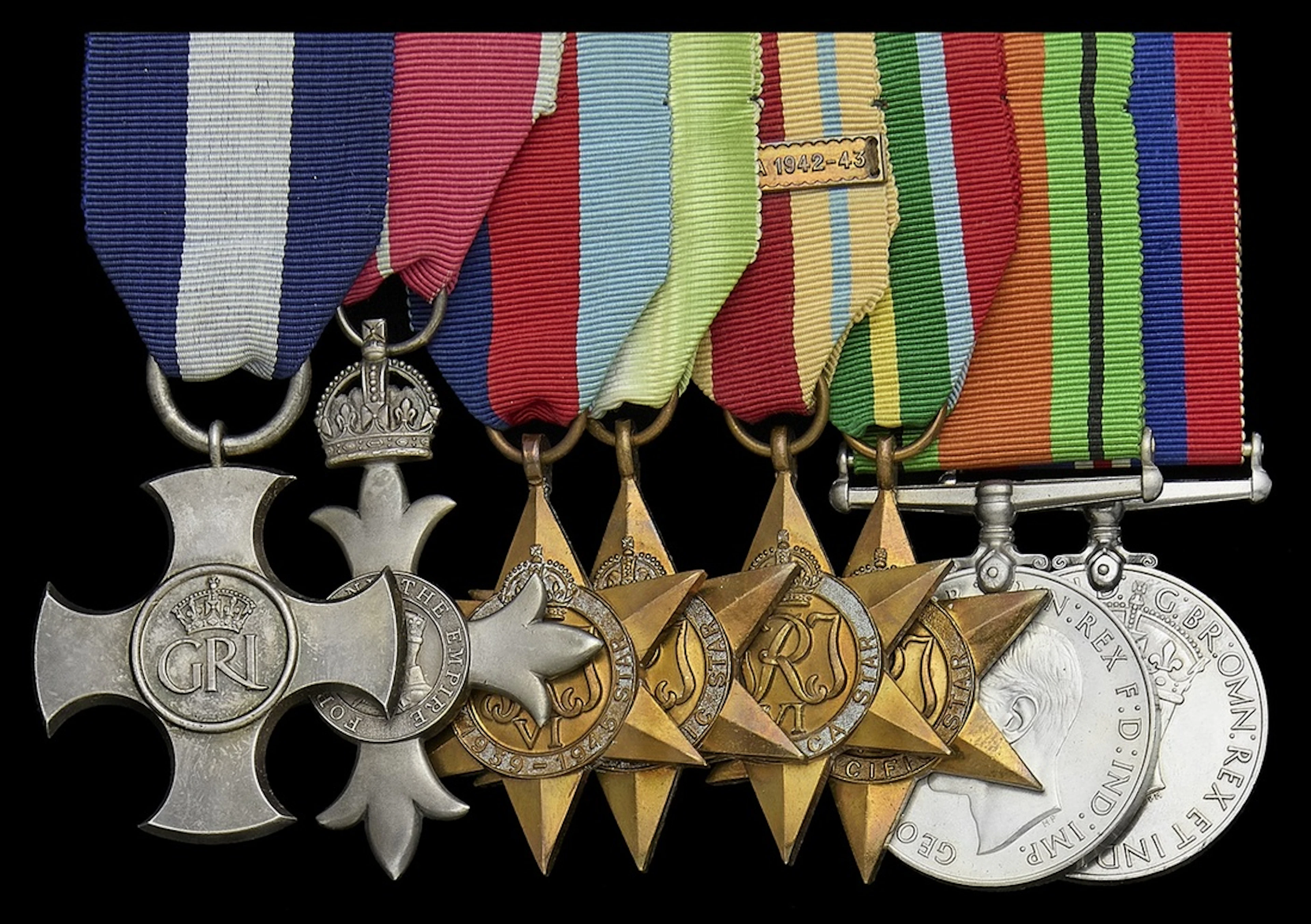 A 1949 M.B.E. and 1943 D.S.C. group of eight awarded to Commander