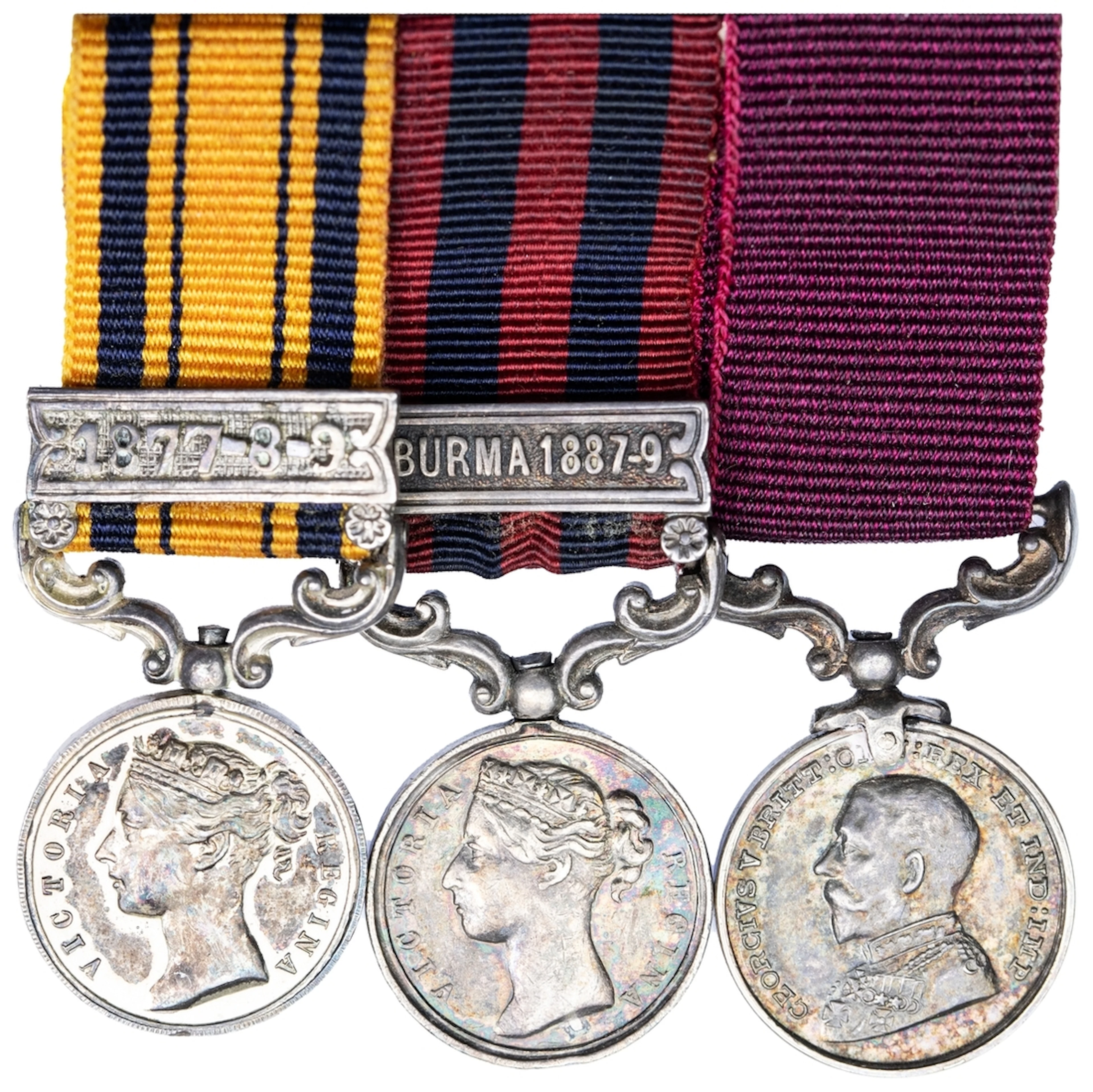 GROUP OF THREE MINIATURE MEDALS WORN BY A COMMANDER AT RORKE'S DRIFT