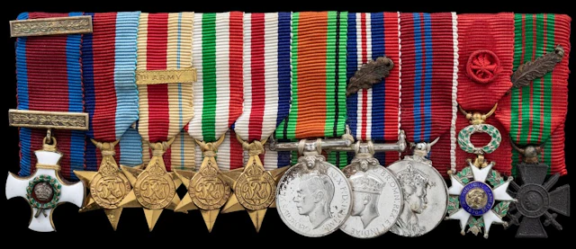 The impressive mounted D.S.O. group of ten miniature dress medals...