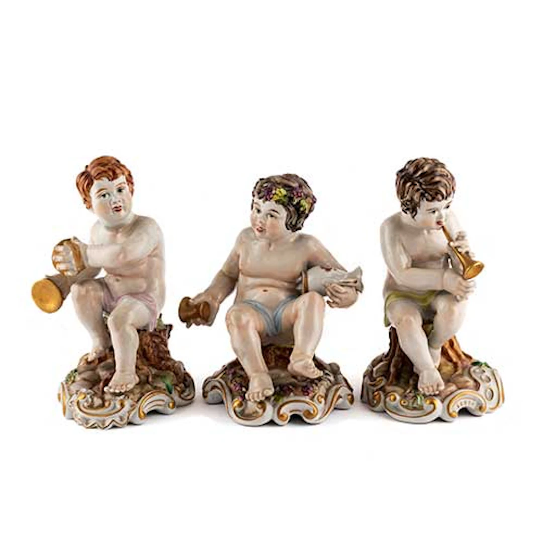 Lote de tres nios msicos en porcelana