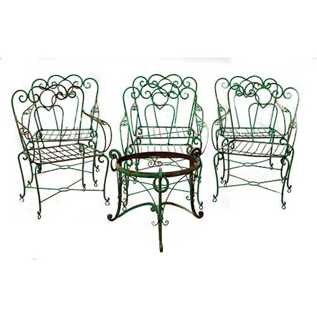 Seis sillones y base para mesa de jardn en hierro forjado de primera