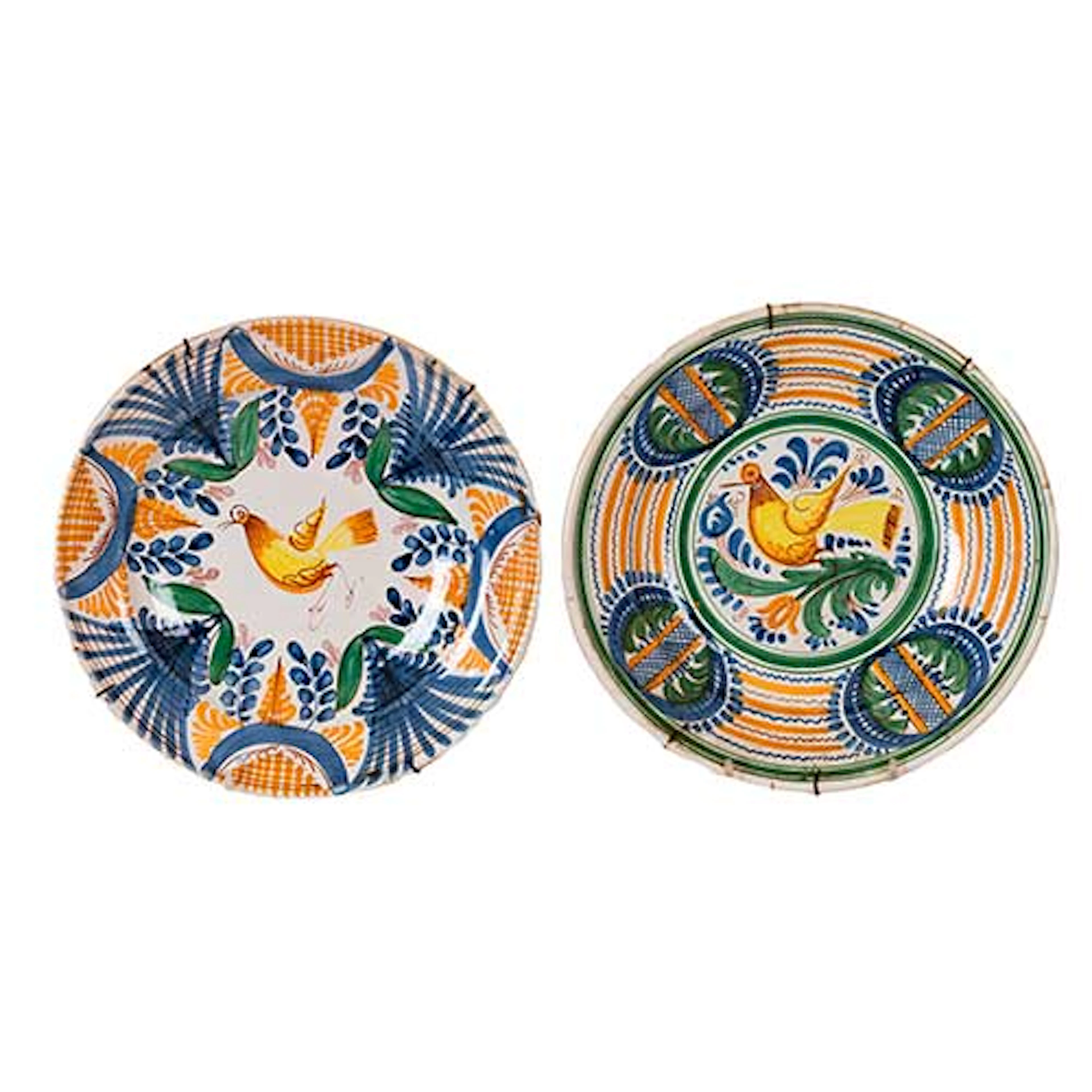 Dos platos de Manises con motivos de pjaros. Tonos amarillos.