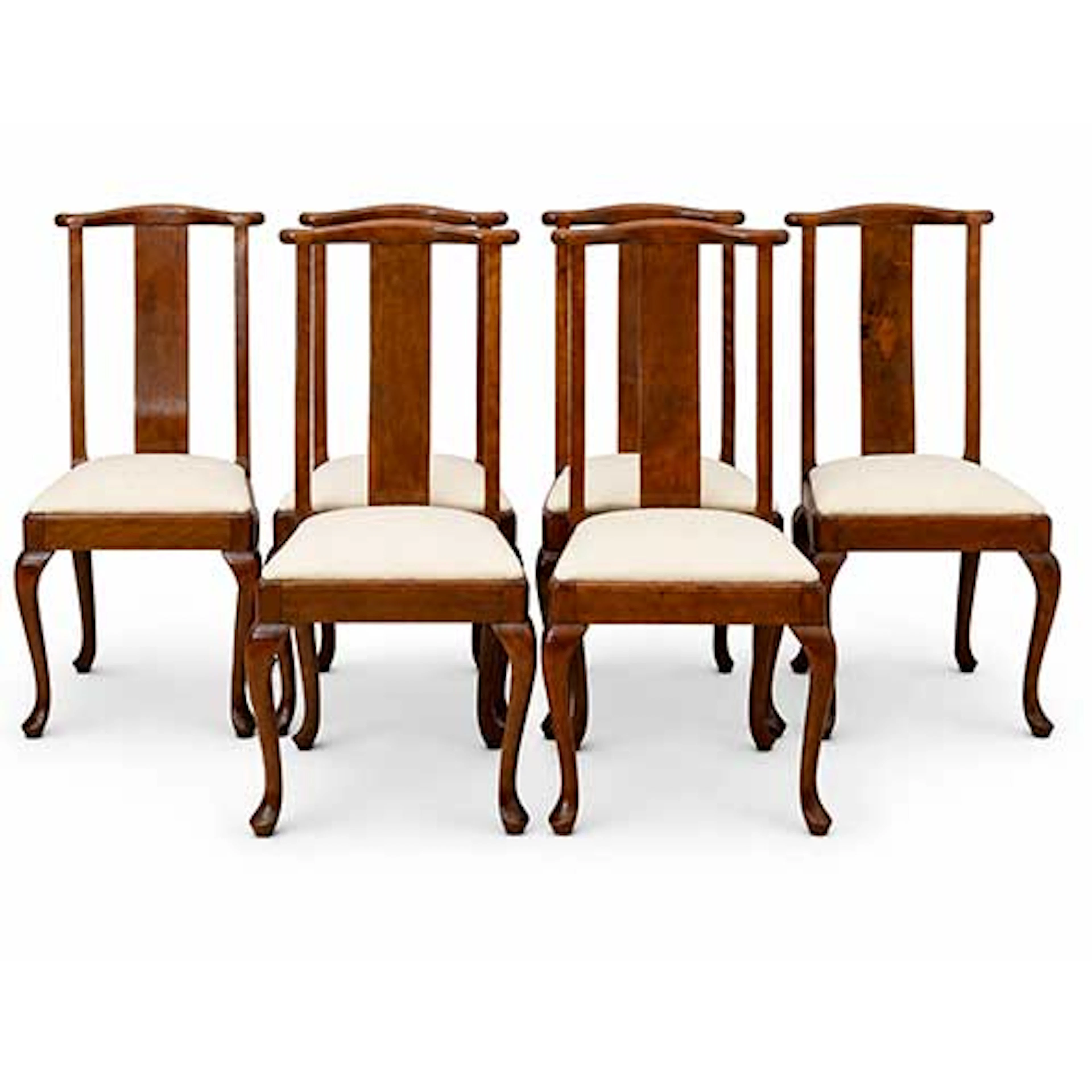 Seis sillas de comedor de respaldo alto y pala.