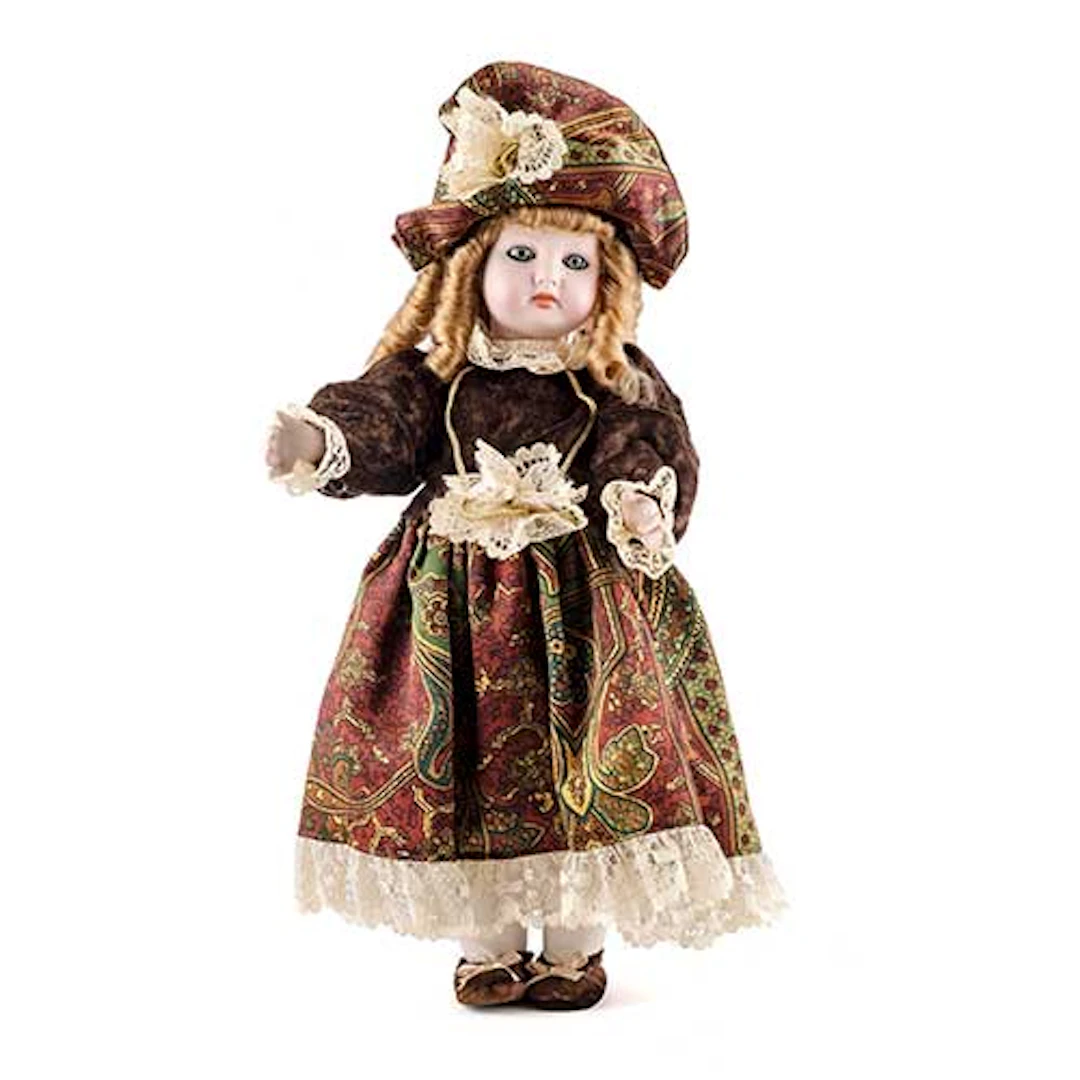 Mueca con cabeza de porcelana, con marca de Ramn Ingles 27 en la nuca.