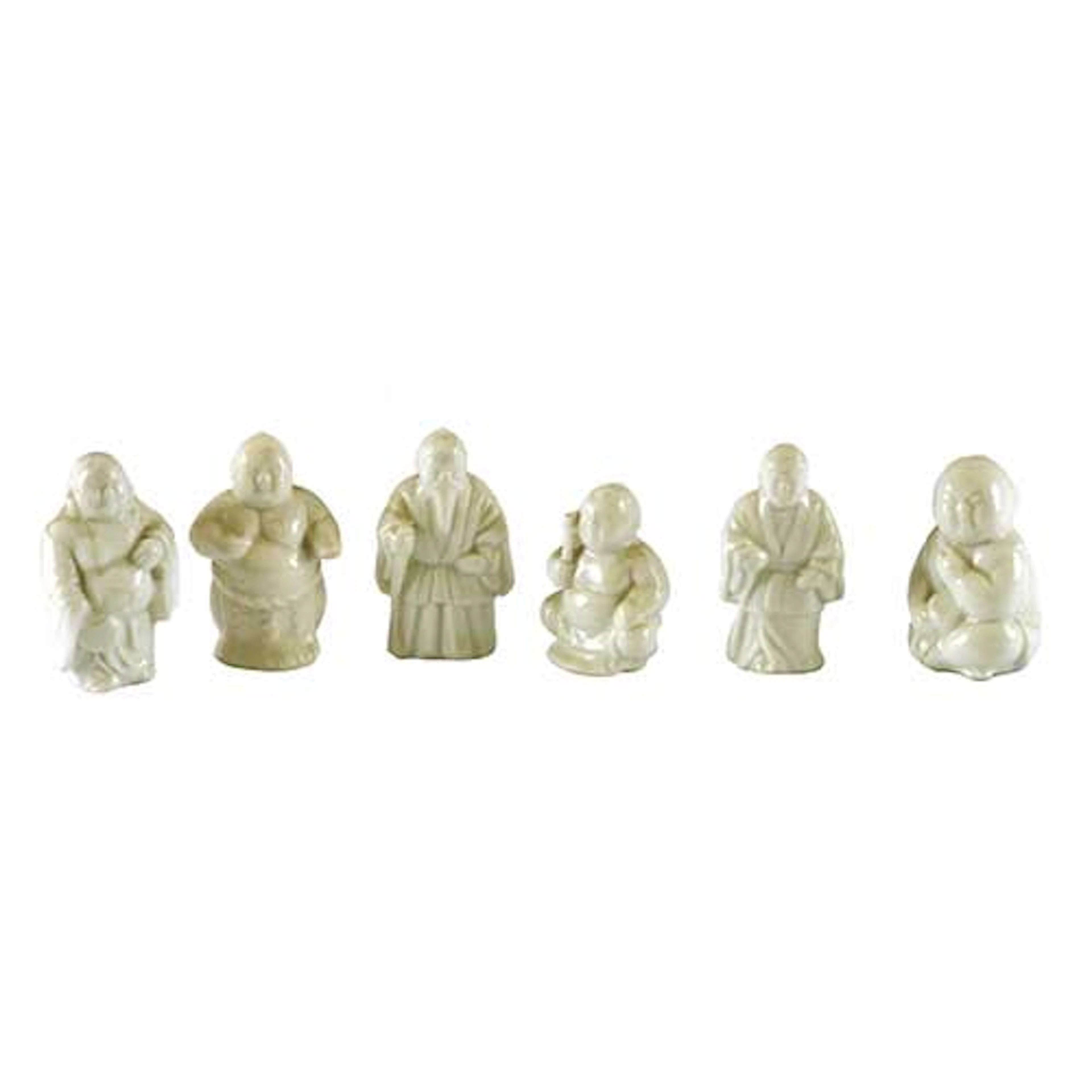 Lote de seis sabios en porcelana blanca.