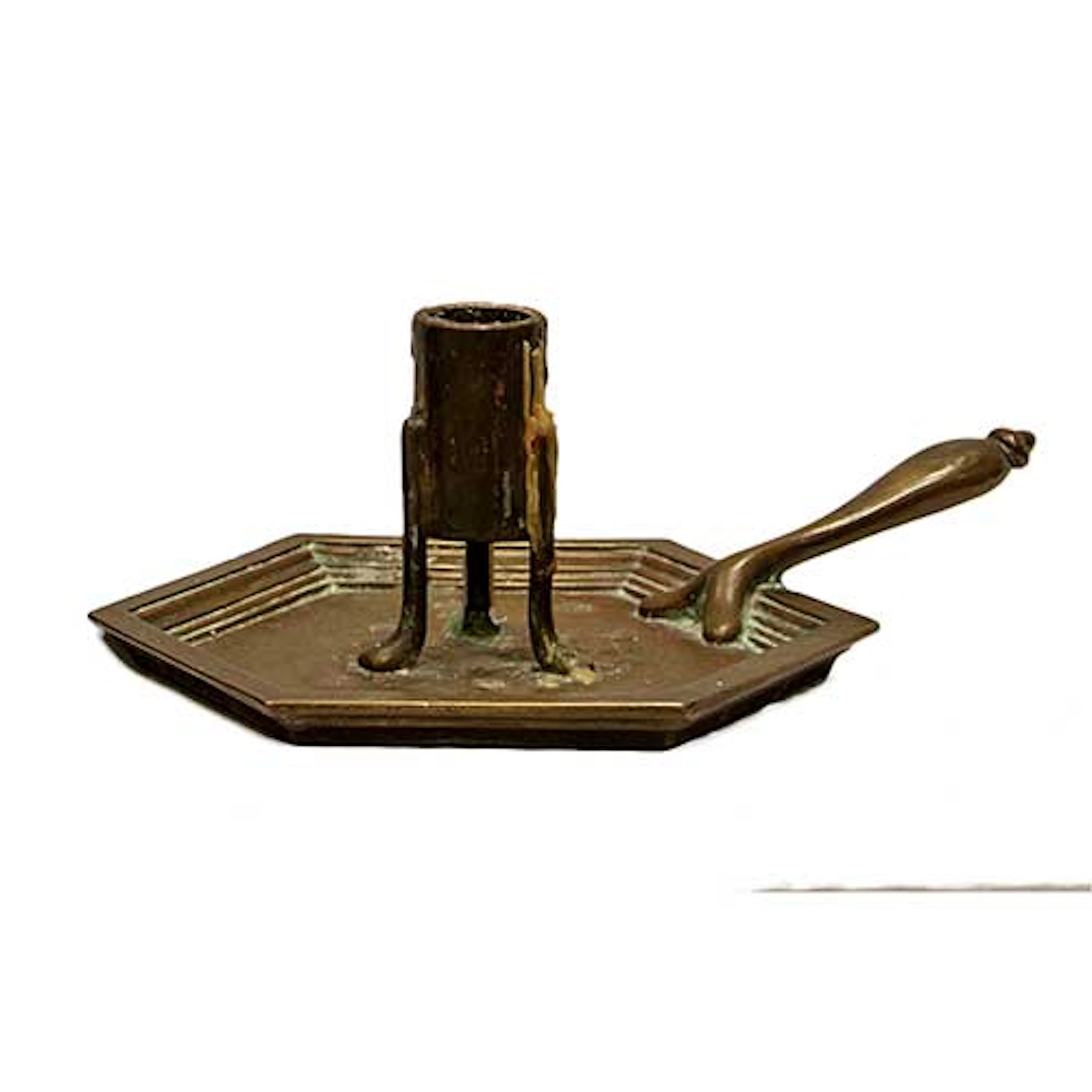 Palmatoria en bronce de base hexagonal.