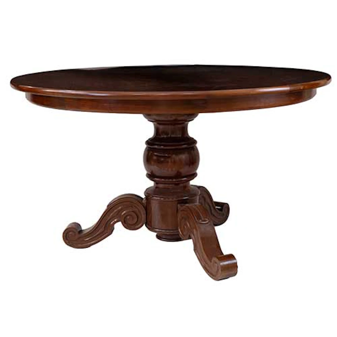 Mesa redonda de comedor en madera patinada.