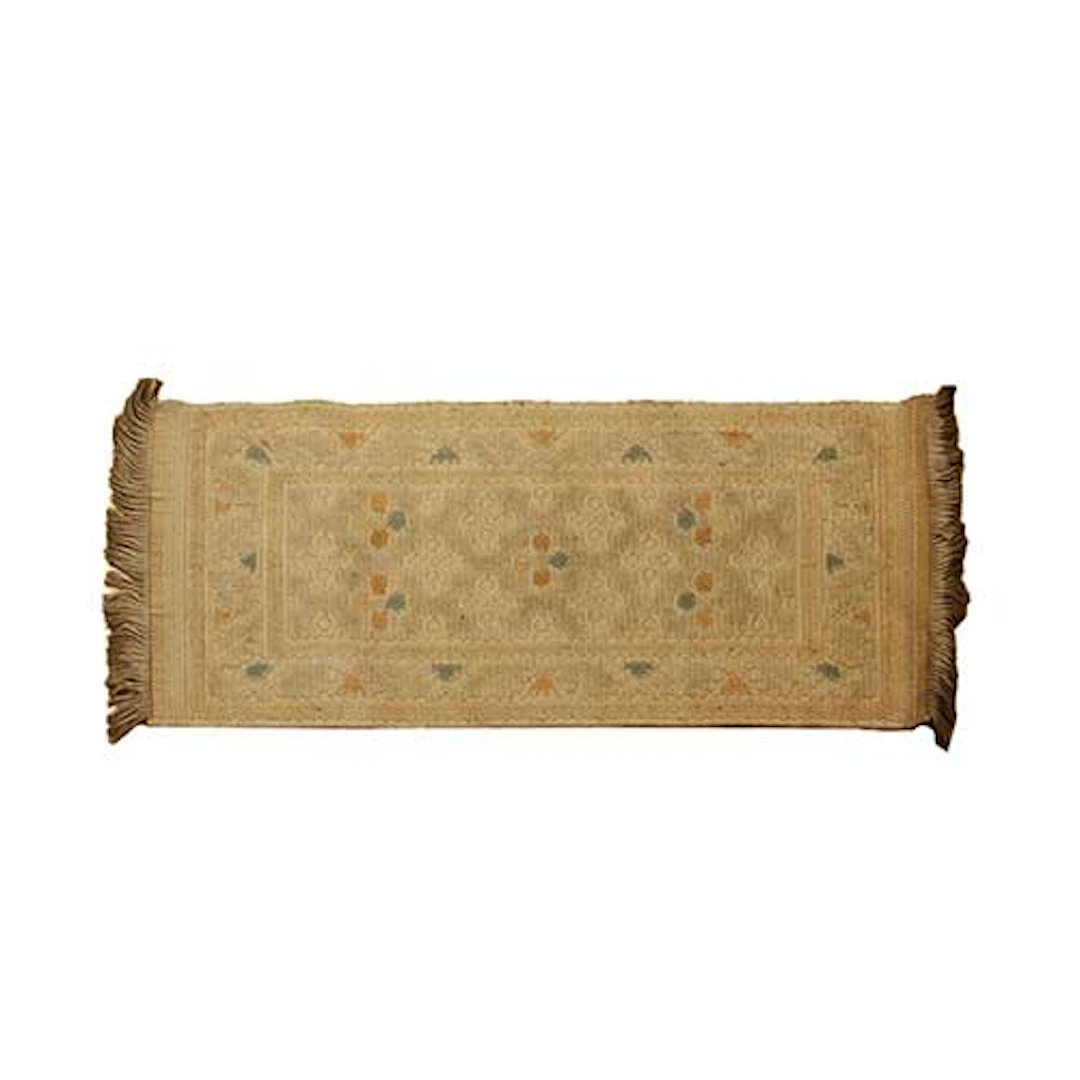 Pequea alfombra de lateral de cama en lana con motivos geomtricos