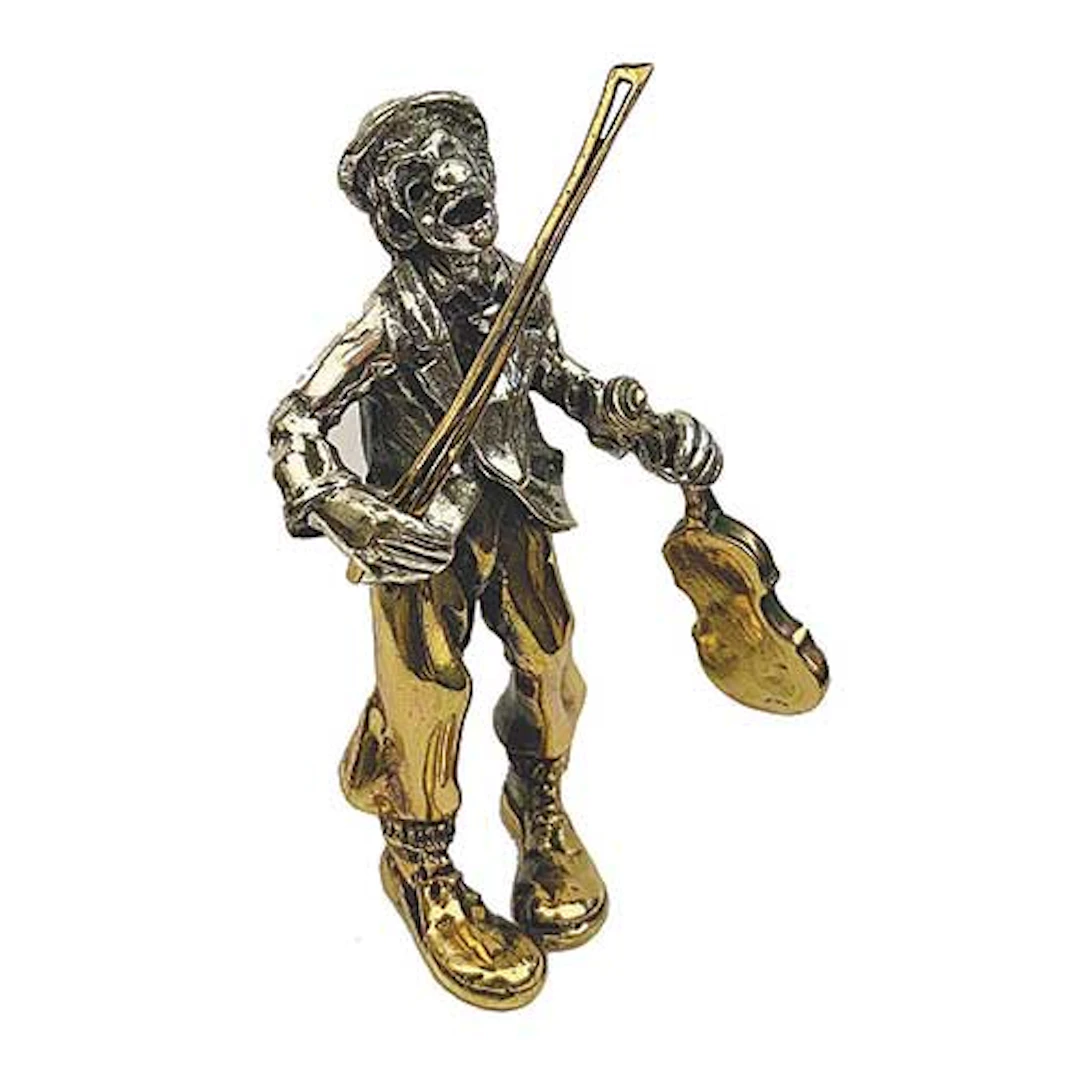 Msico del joyero Alberti realizado en plata en su color y dorada.