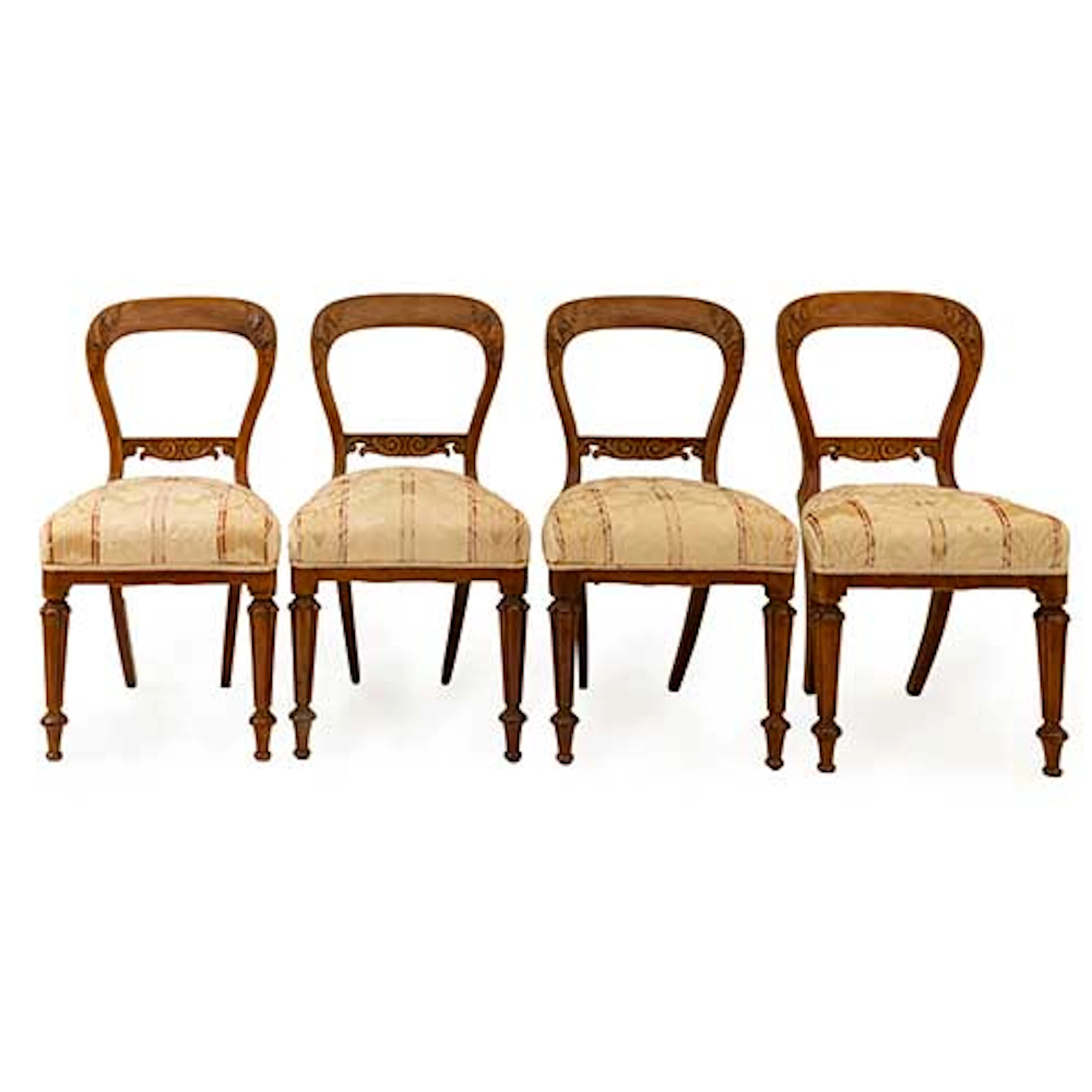 Ocho sillas inglesas en madera de caoba talladas hacia 1900