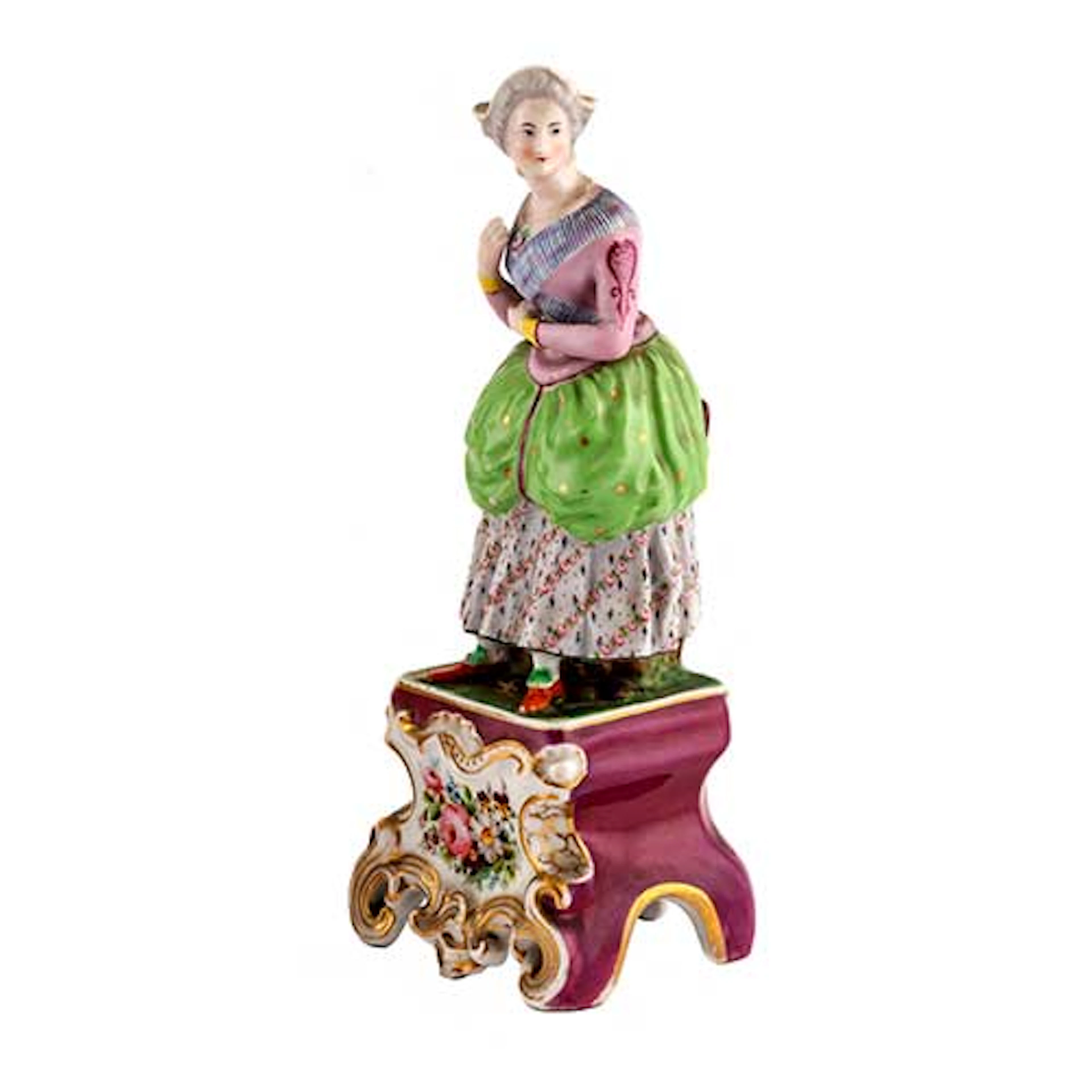Dama sobre peana decorada con flores, en porcelana francesa