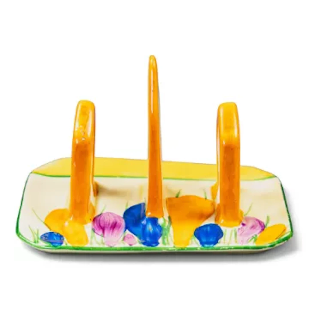 A Clarice Cliff toast rack in the Crocus pattern, height 8cm, factory