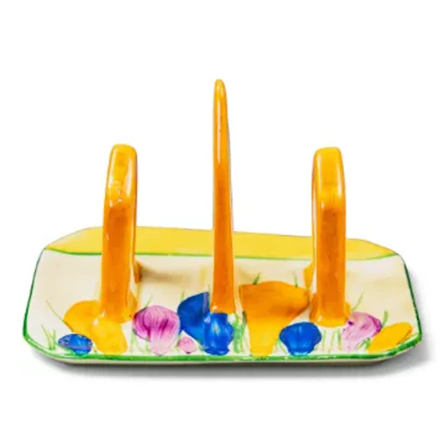 A Clarice Cliff toast rack in the Crocus pattern, height 8cm, factory