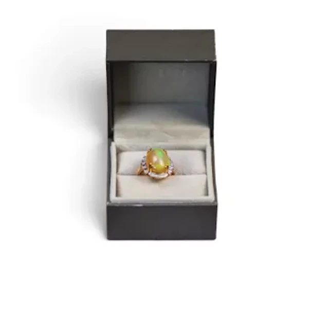 18ct yellow gold opal & diamond ring size N/O, by Lorique. With COA. 7.47g.