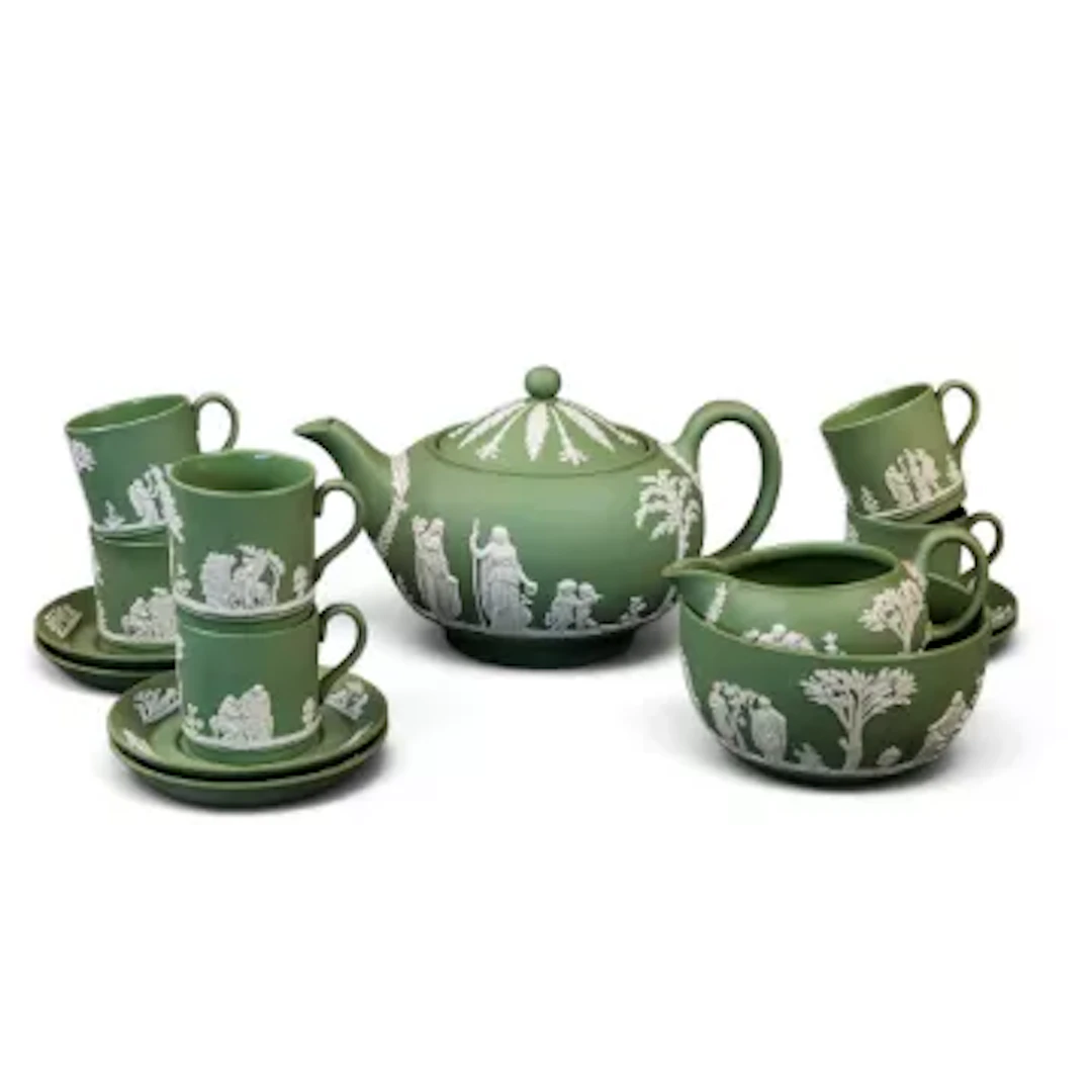 A Wedgwood sage green Jasperware teaset, comprising of a teapot sugar