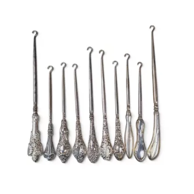 10 x hallmarked silver handled (loaded) button hooks, part of a large