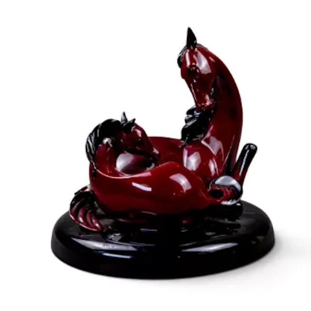 A Royal Doulton Flambe figure group, 'The Gift of Life' from the Images