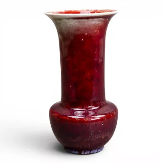 Ruskin vase in the Flambe Sang de Boeuf glaze, some blue spotting