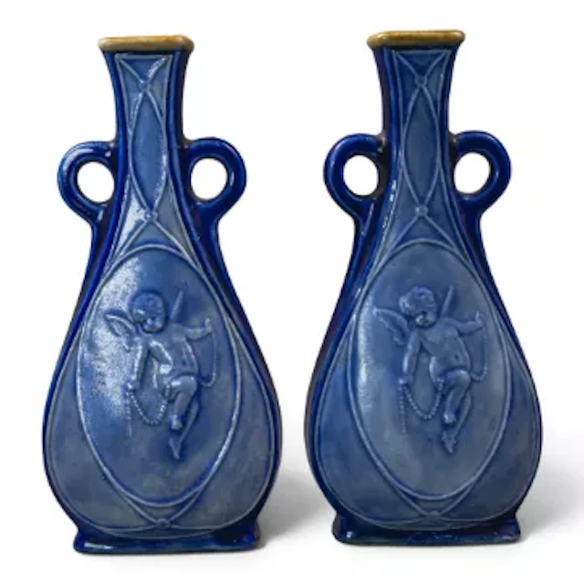A pair of Doulton Lambeth ware stoneware twin handled flask type vases