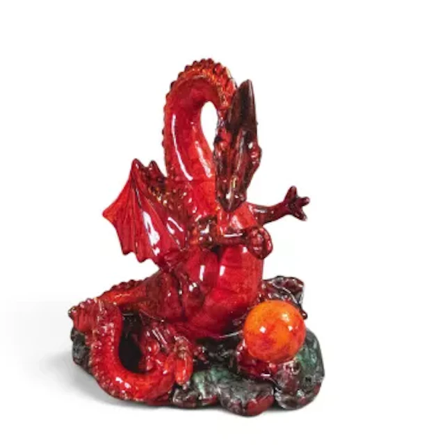Anita Harris model of a treasure dragon with lustre enamel glazes.