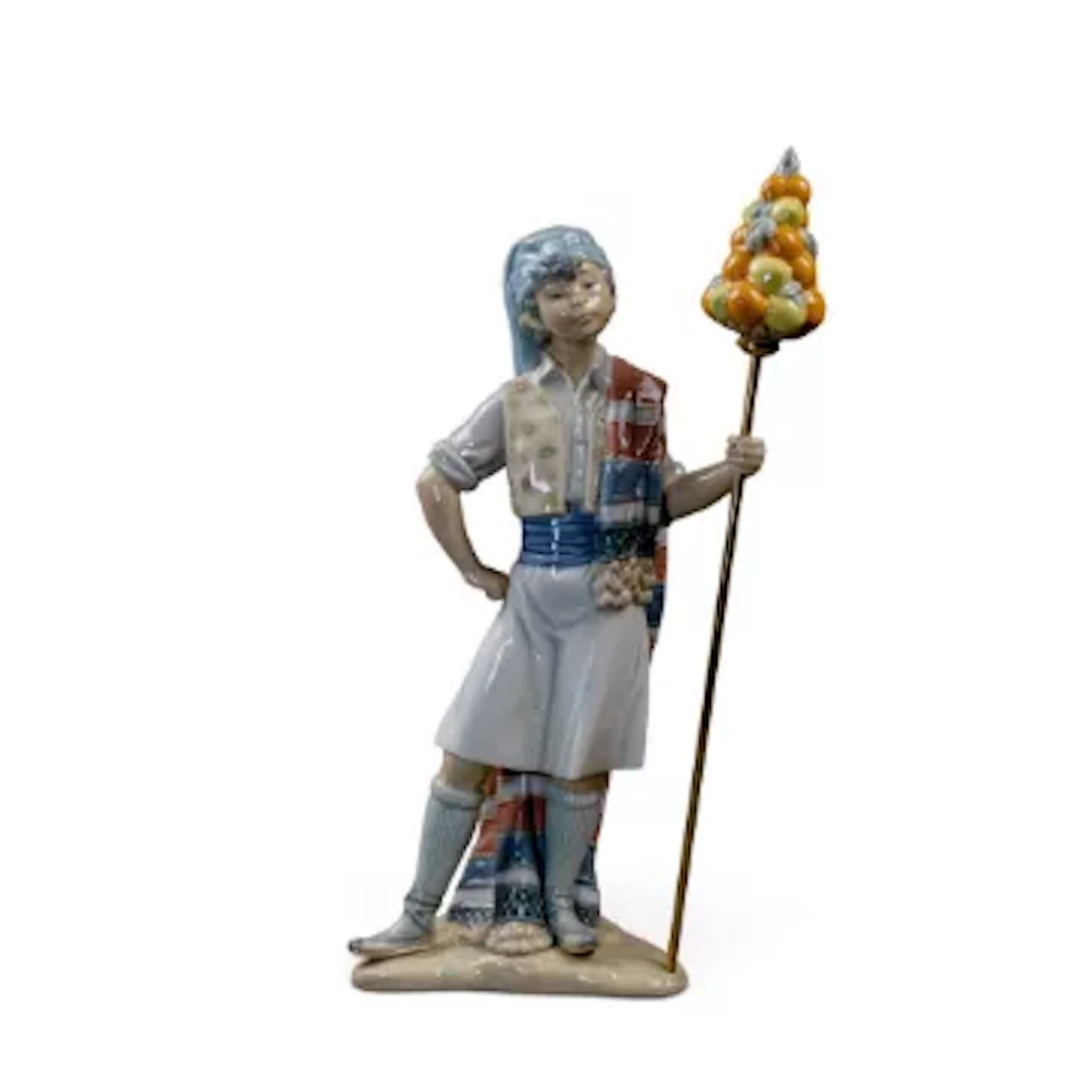 A Lladro Figure 'Valencian Boy' model number 1400 designed by Salvador
