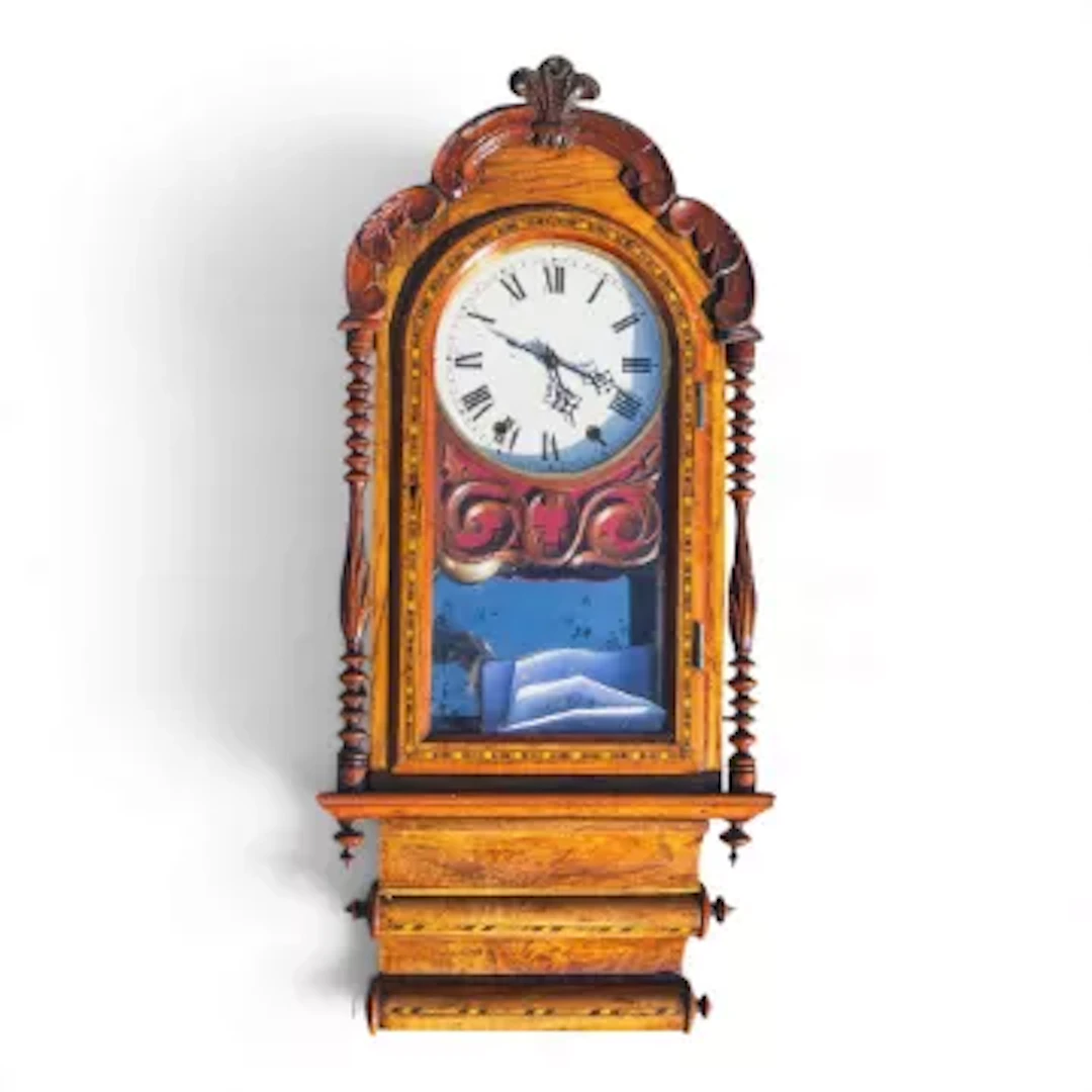 A 19th-century American 8-day walnut cased wall clock featuring Roman