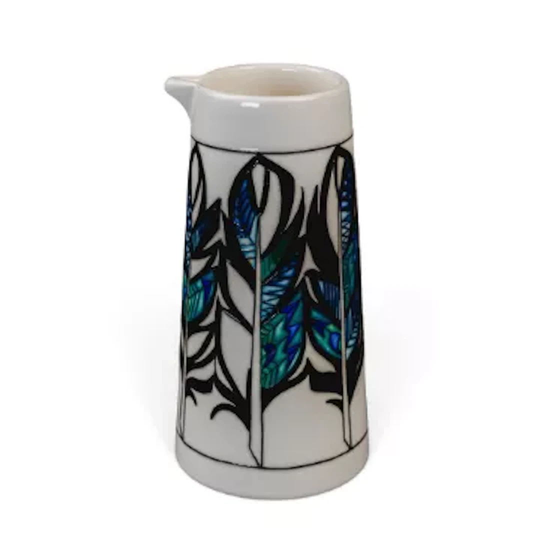 A Moorcroft Puzzlewood Feather pattern jug designed by Emma Bossons, h.20.5cm.