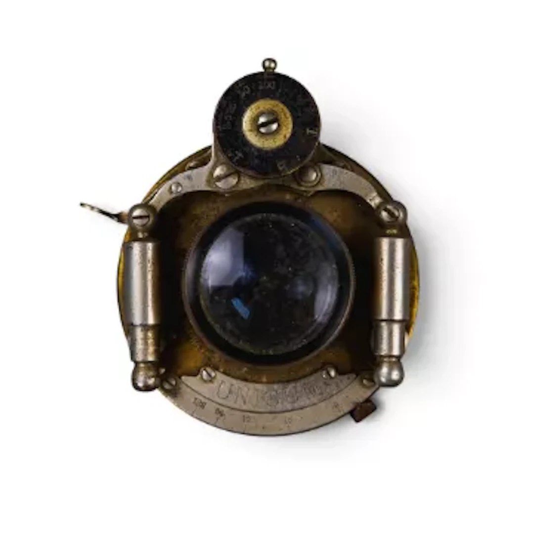 Bausch & Lomb Unicum pneumatic diaphragm shutter and brass lens assembly.