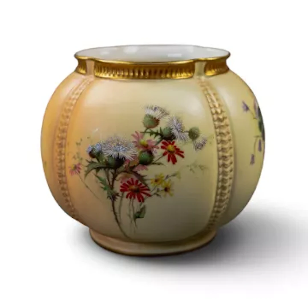 A Royal Worcester bulbous vase decorated with thistles and flowers