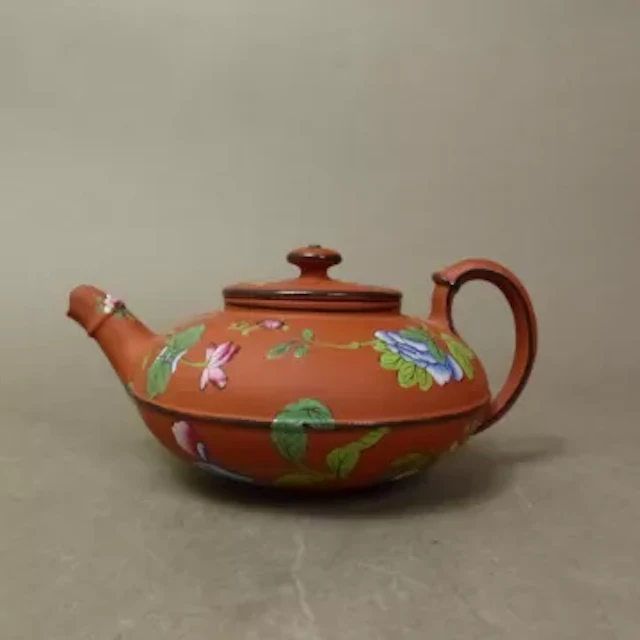 Wedgwood teapot in ‘Rosso Antico’, Capri Ware, brightly enamelled