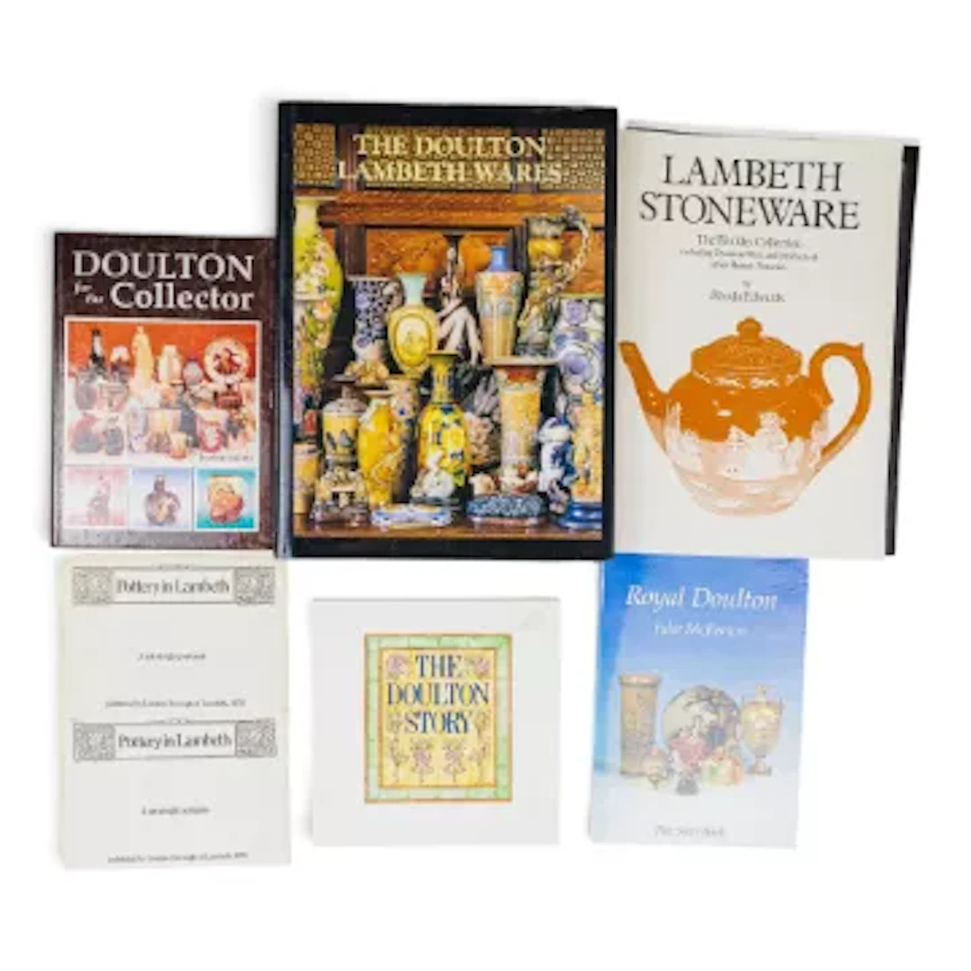 A group of books & ephemera relating to Royal Doulton & Doulton Lambeth
