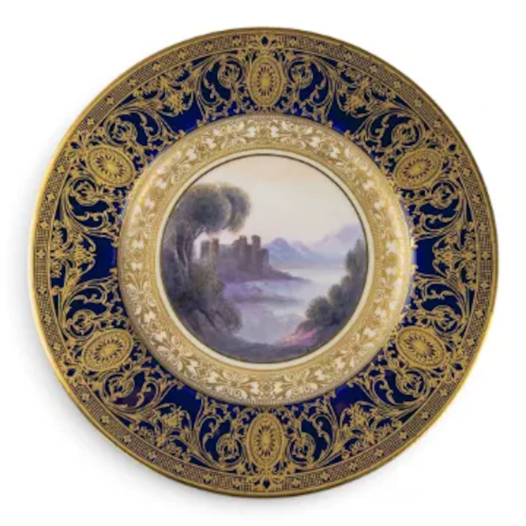 A Royal Worcester plate decorated with landscape scene of Caldicot