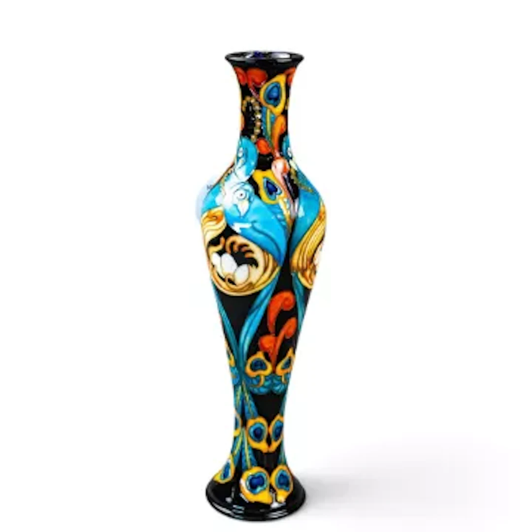 A Moorcroft limited edition vase in the Proud as Peacocks design by