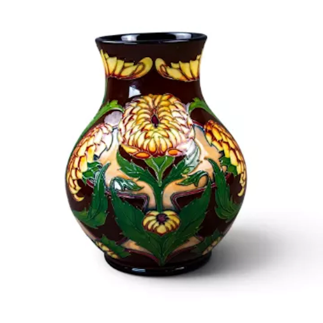 A Moorcroft limited edition vase in the Dahlia design by Philip Gibson
