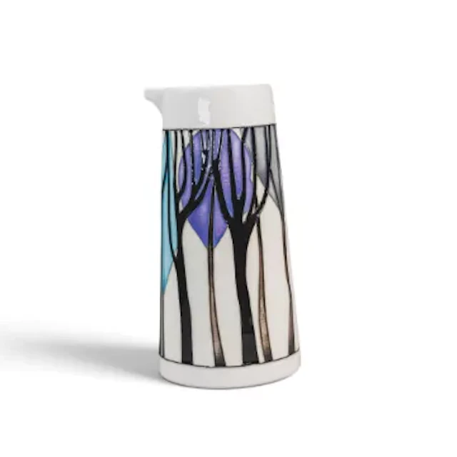 A Moocrcoft Puzzlewood Forest pattern jug designed by Emma Bossons