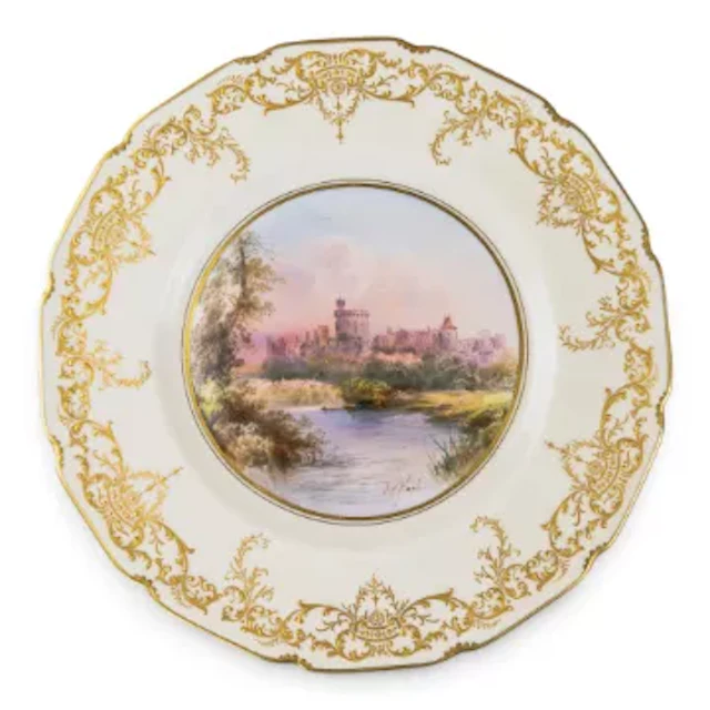 A Royal Doulton plate ornately decorated, featuring Windsor Castle