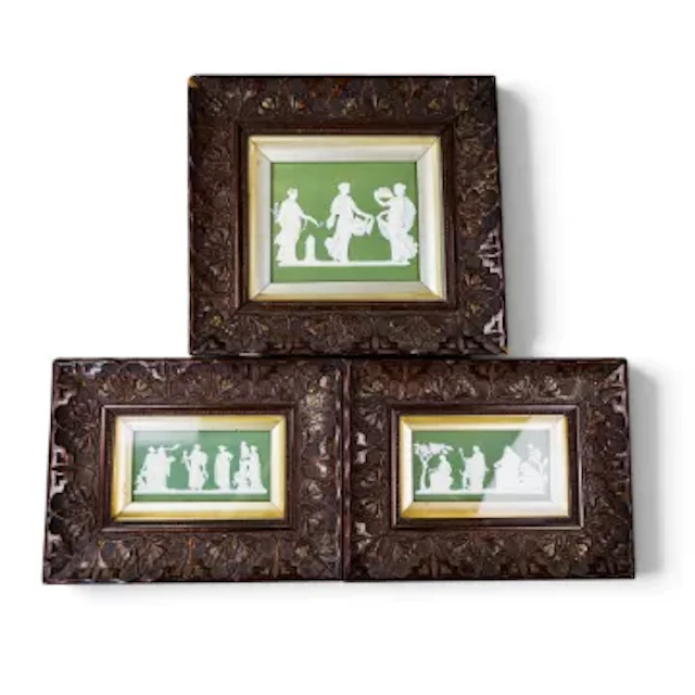 A group of three 19th Century framed sage green Jasperware plaque