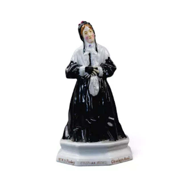 An early Royal Doulton figure 'Mr. W S Penley' in his role as Charleys