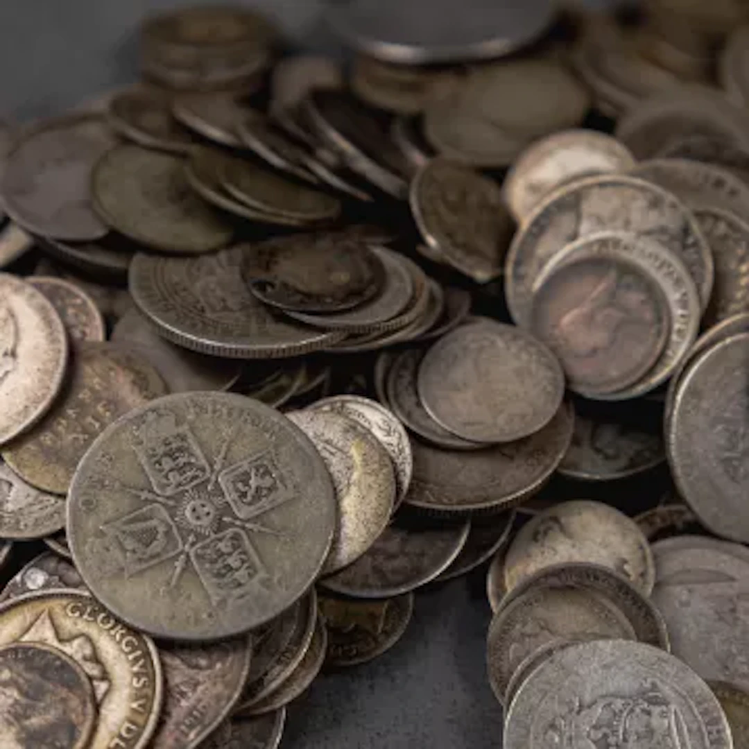 Pre 1920 UK silver coinage 92.5% sterling silver or 92.5% pure. Damaged