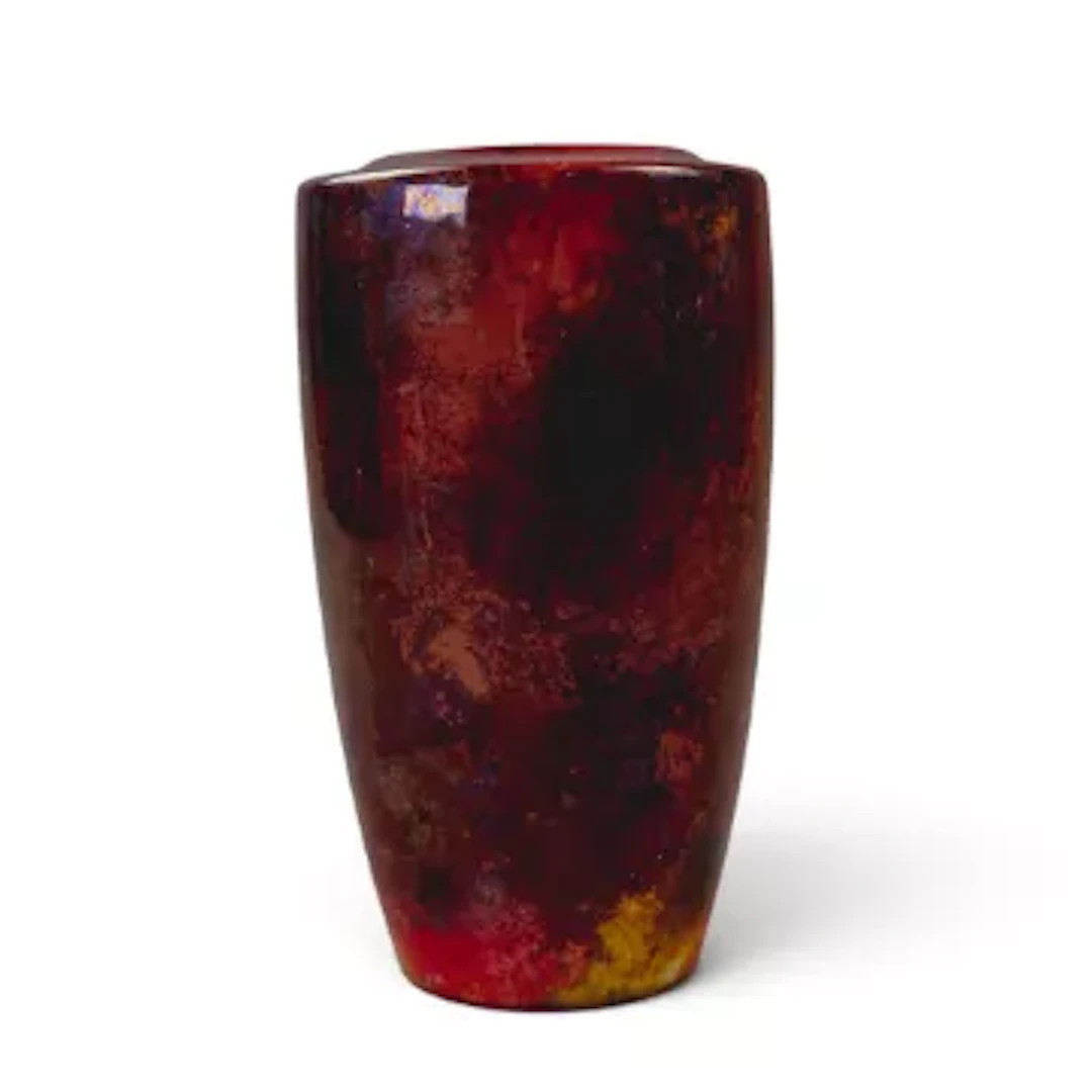 A Royal Doulton Flambe vase by Harry Nixon, c1920, h.17cm, signed HN to base.